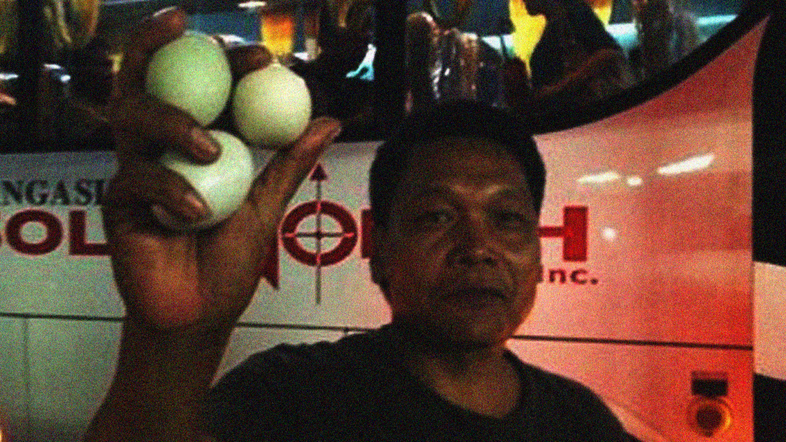 Man holding balut